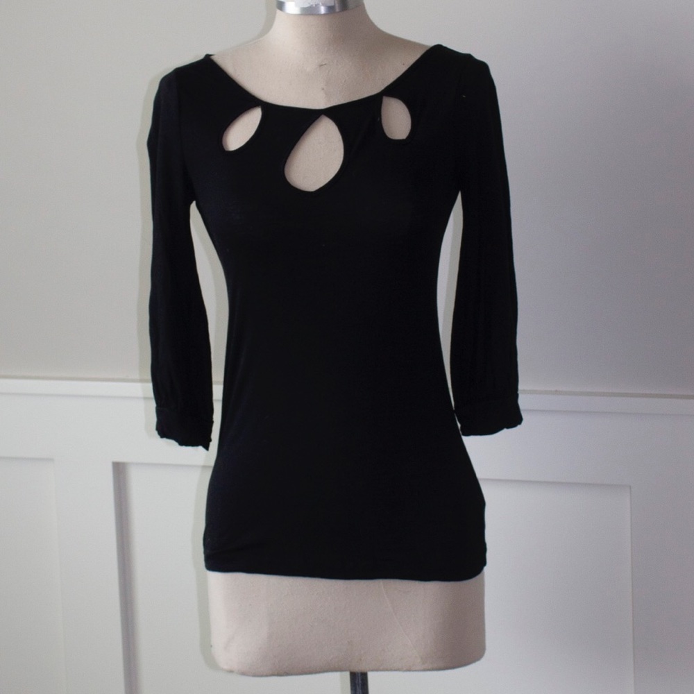 Anthro black teardrop cutout blouse